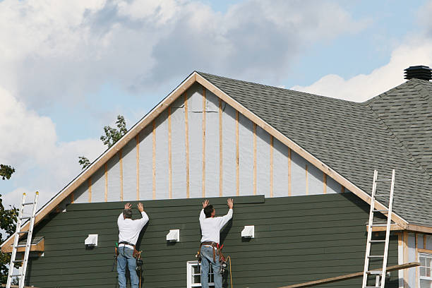 Professional Siding Contractor technician working in Peabody, MA